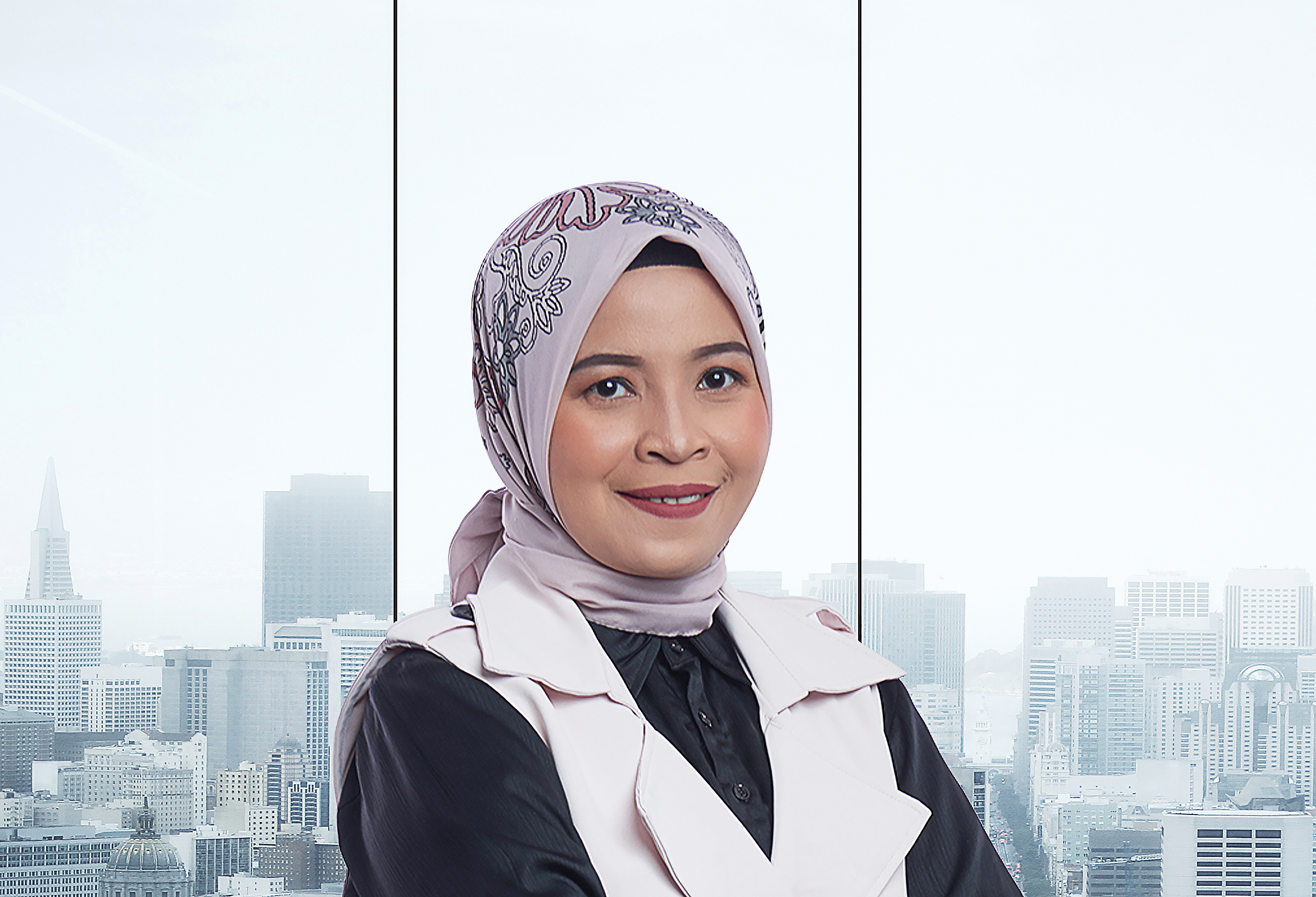 Desi Arifianti-Member of Nomination & Remuneration Committee